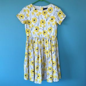 White dress with yellow floral design